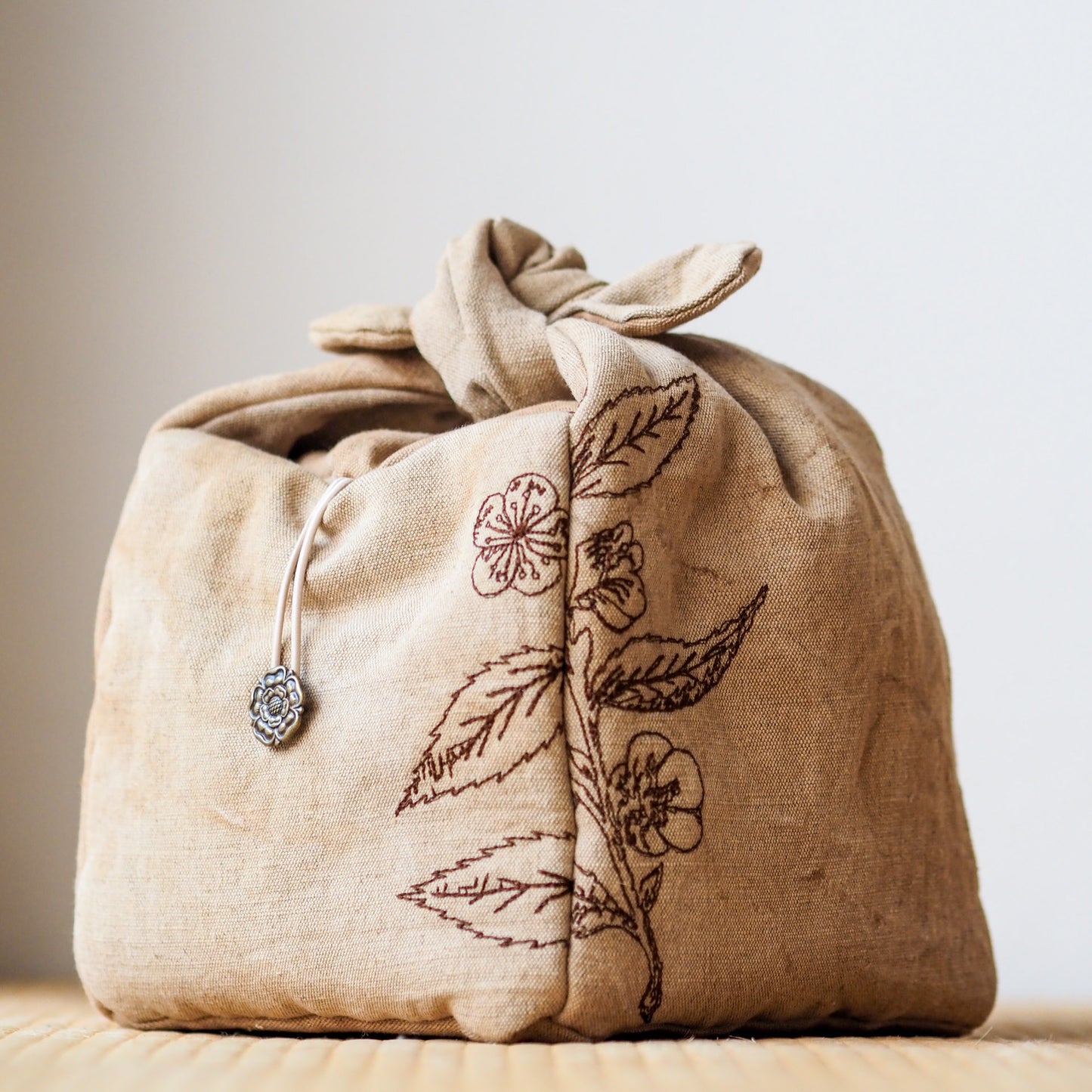 Tea-Dyed Travel Bag With Camellia Sinensis Embroidery