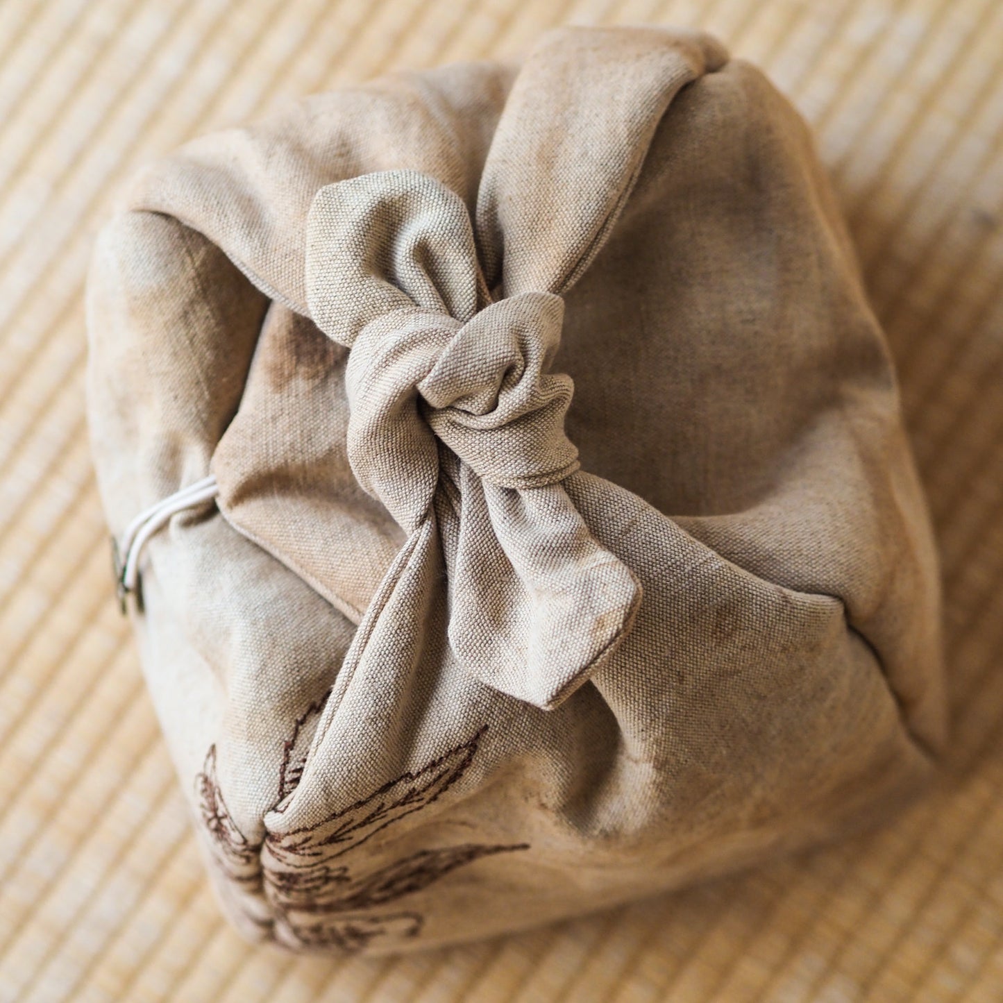 Tea-Dyed Travel Bag With Camellia Sinensis Embroidery