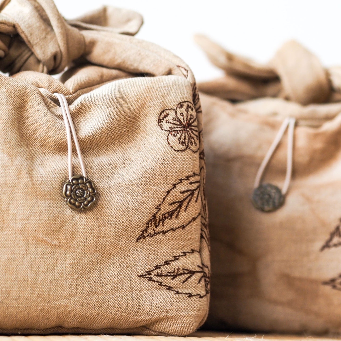 Tea-Dyed Travel Bag With Camellia Sinensis Embroidery